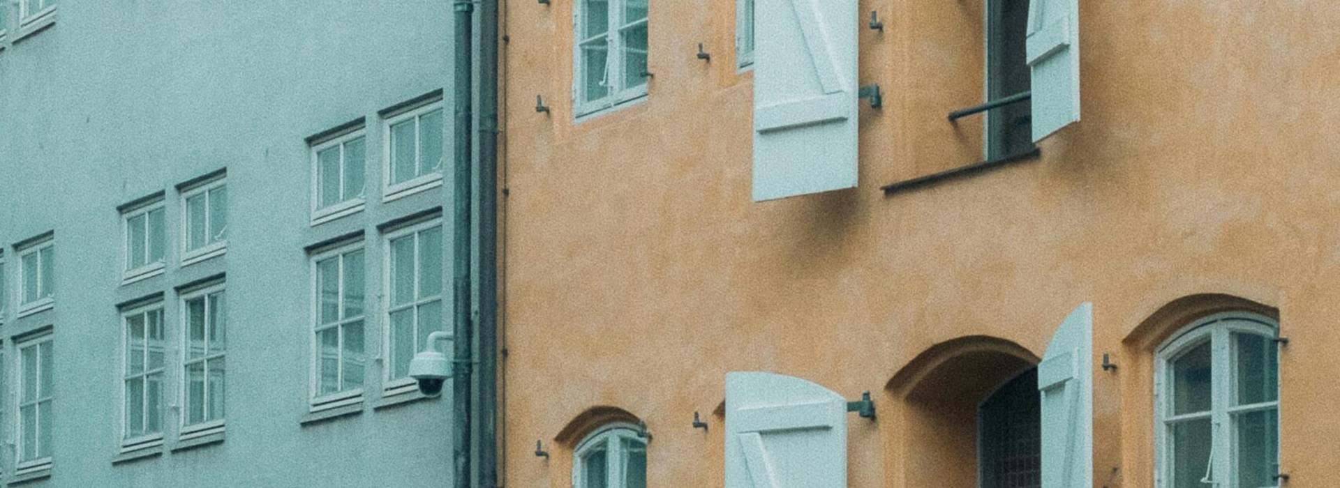 Property facade — TXM specialises in strategic acquisition and active development of real estate