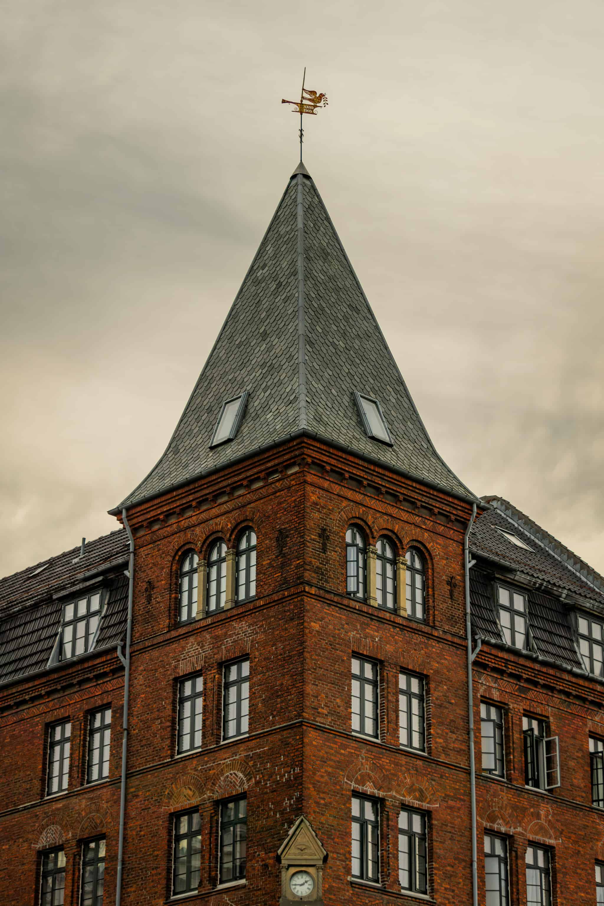Architectural detail from an urban property — TXM's investment approach in Denmark is data-driven, institutional, and risk-aware