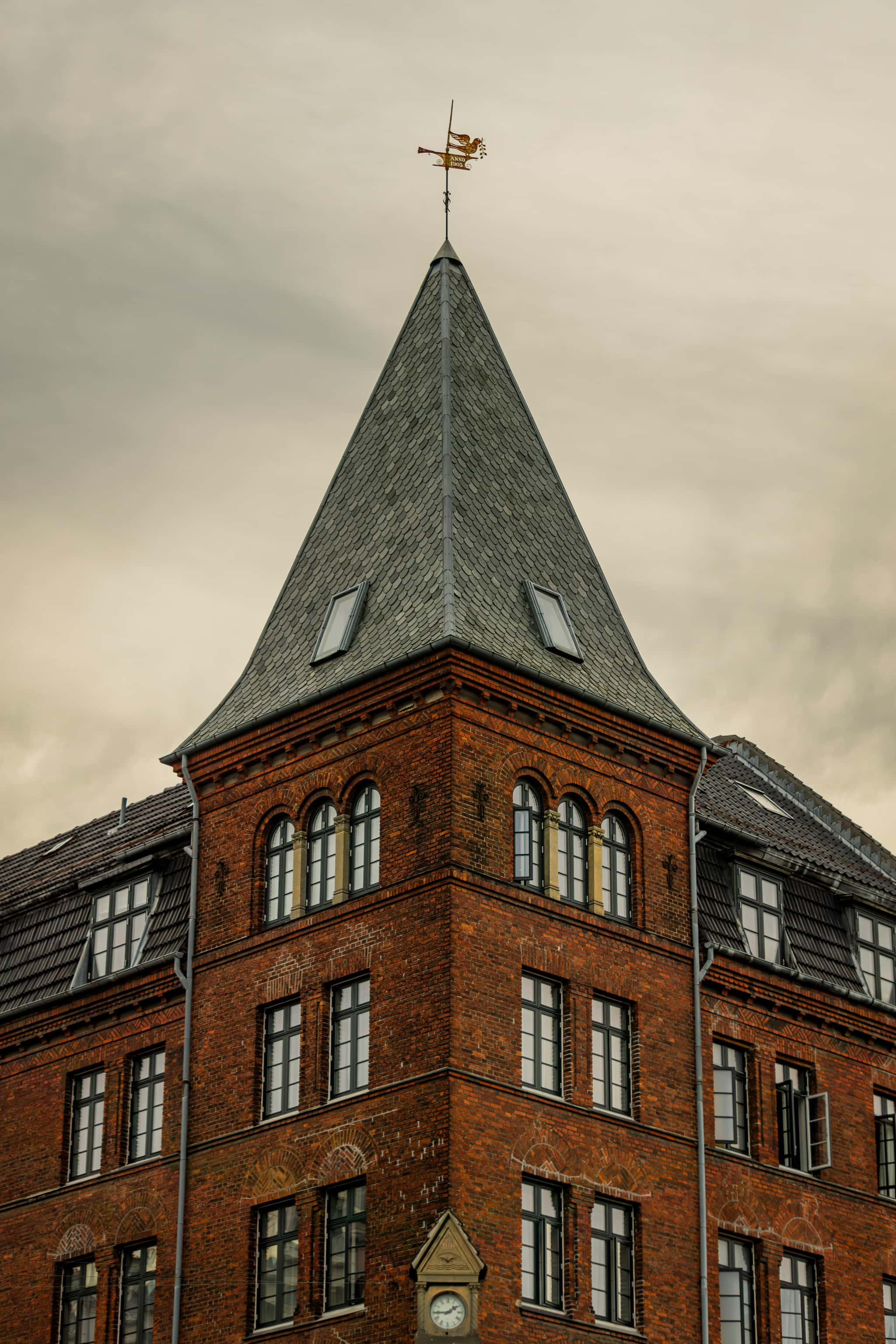 Architectural detail from an urban property — TXM's investment approach in Denmark is data-driven, institutional, and risk-aware